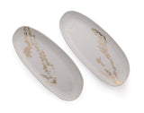 Two oval serving dishes - Enigmatic script set
