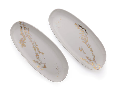 Two oval serving dishes - Enigmatic script set